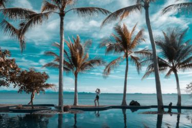 happiness quotes woman palm trees