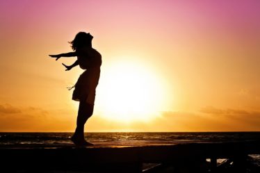 strong women quotes lean into wind sunset